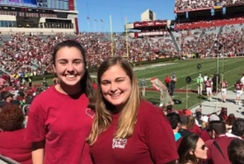 Two women at a University of South Carolina football game